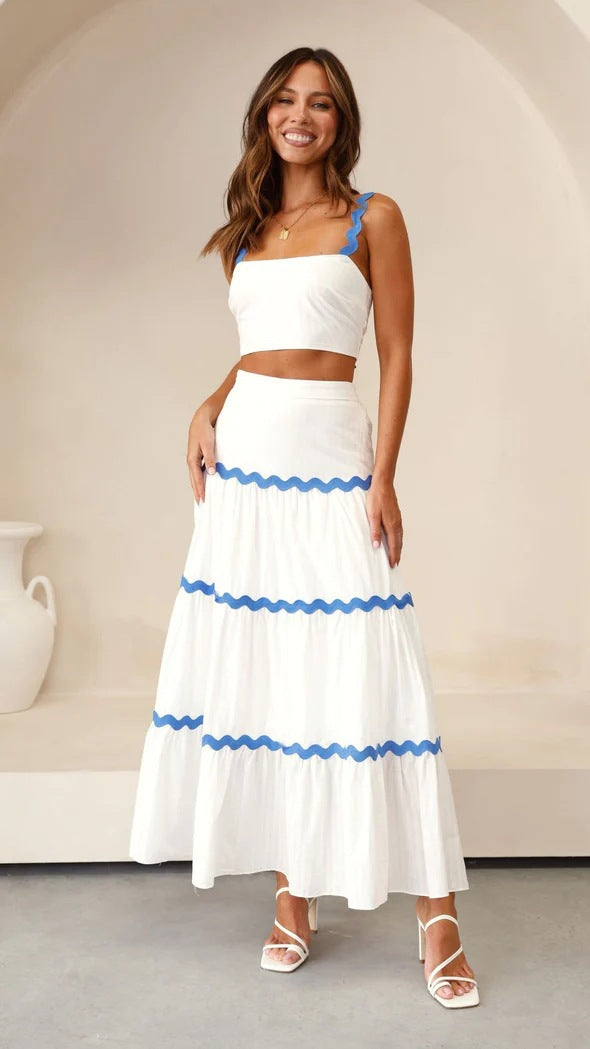 Elegant women's two-piece set: strapless crop top and a beautiful tiered maxi skirt. Perfect for summer fashion.