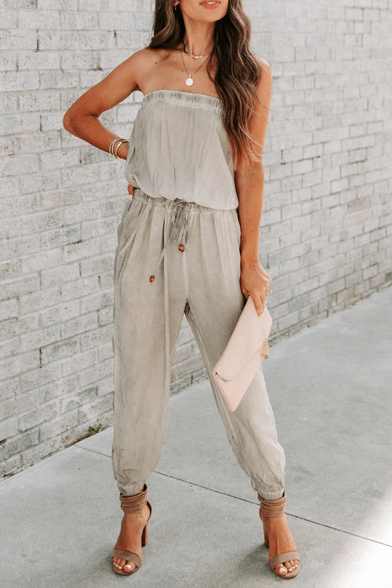 Elegant women's strapless jumpsuit with drawstring waist, perfect for stylish summer casual outfits.