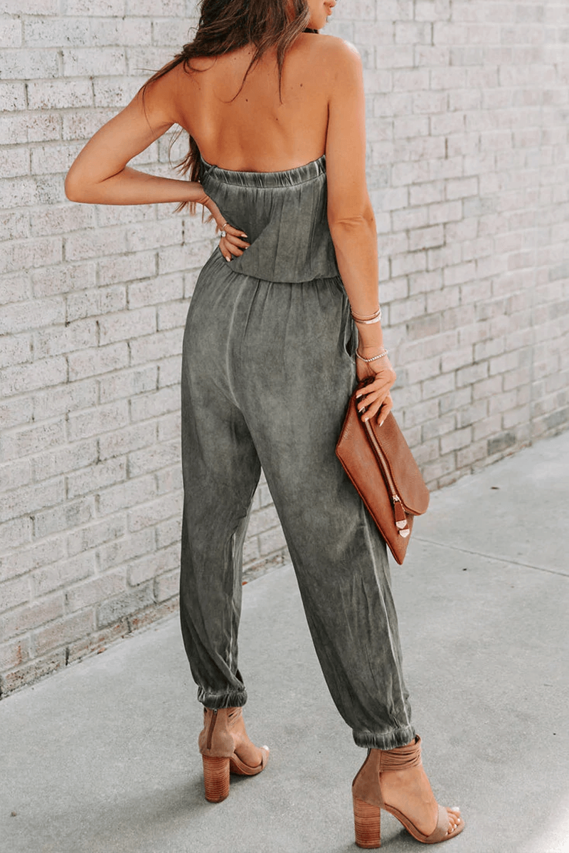 Chic women's strapless drawstring jumpsuit in polyester. Effortless summer one-piece for a fashionable look.