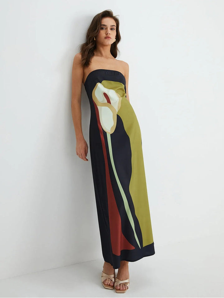 Elegant women's strapless maxi dress with vibrant print. Perfect for summer parties, evening, or resort wear.