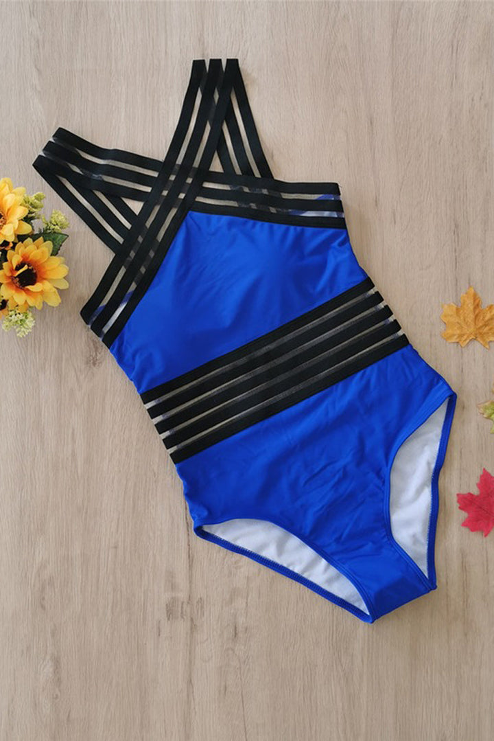 Chic strappy monokini swimsuit, offering a flattering silhouette for women's summer beach and resort wear.