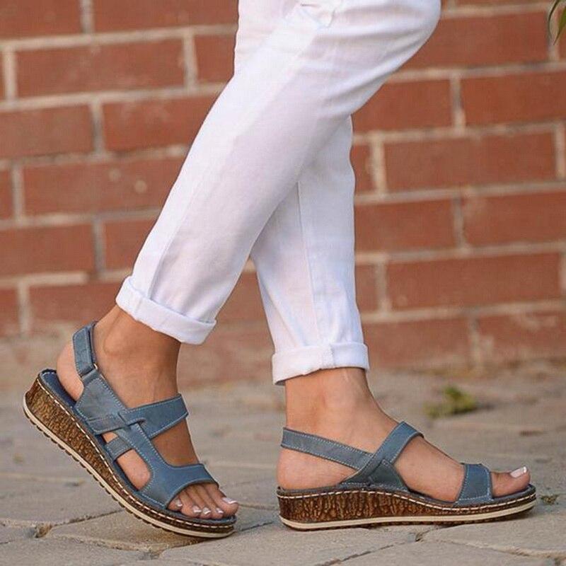 Stylish women's summer wedge sandals featuring multi-strap design and comfortable slingback closure
