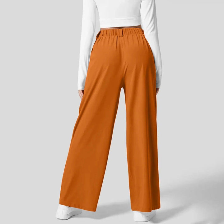 Women's comfortable stretch long pants, ideal for casual wear. Features an elastic waist & flattering fit.