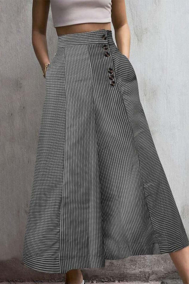 Elegant women's fashion pants: striped, high-waist, wide-leg design for comfortable, stylish casual wear.