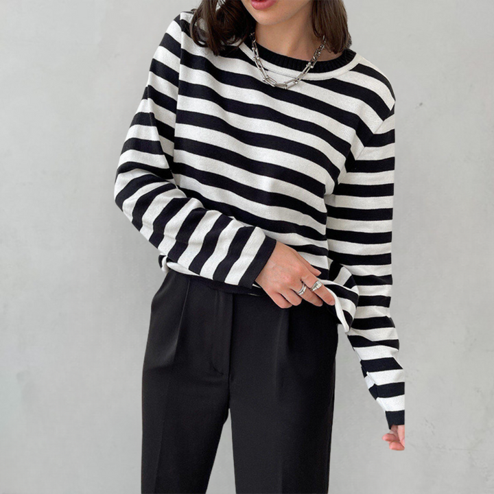Versatile women's long sleeve crew neck striped knit sweater. Ideal casual pullover for autumn fashion.