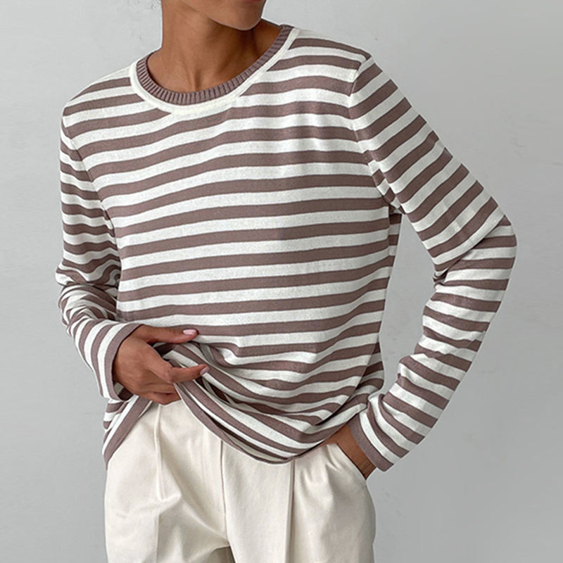 Casual women's striped knit pullover. Cozy long sleeve crew neck sweater, versatile for autumn fashion.