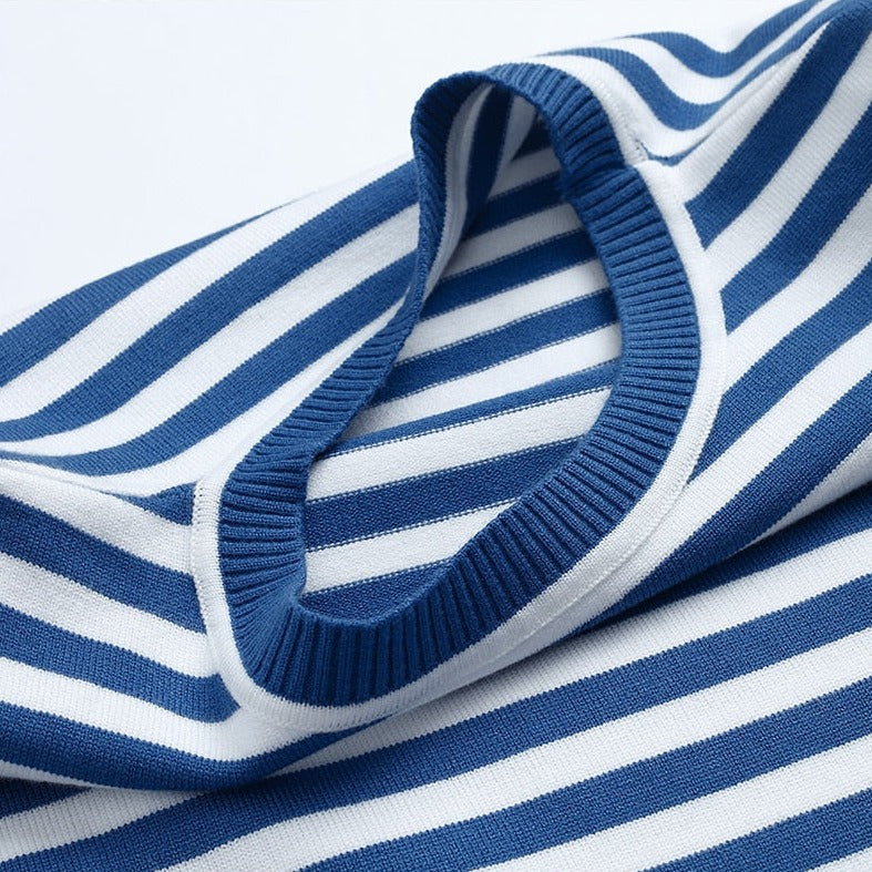 Autumn style women's striped knit sweater. Cozy long sleeve crew neck pullover for cooler days.
