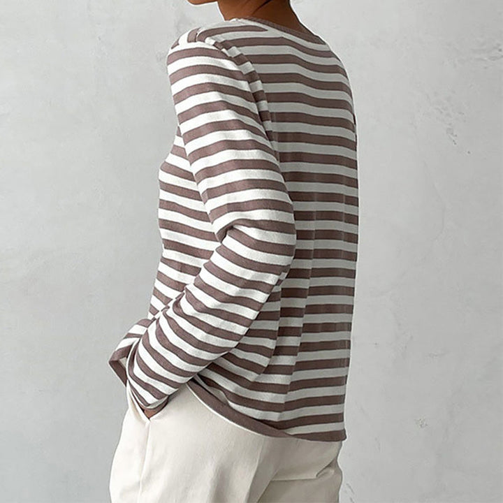 Cozy women's striped knit sweater. Long sleeve crew neck pullover, perfect for cool weather autumn style.