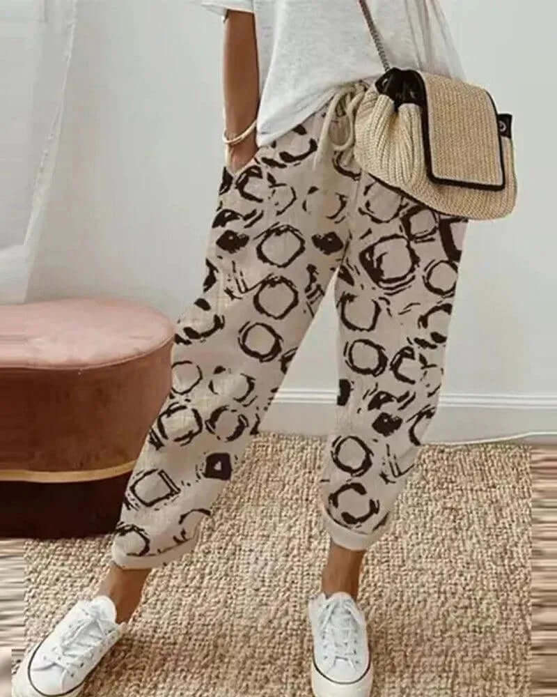 Stylish women's striped linen-blend casual trousers, comfortable & relaxed fit pants with drawstring for summer.