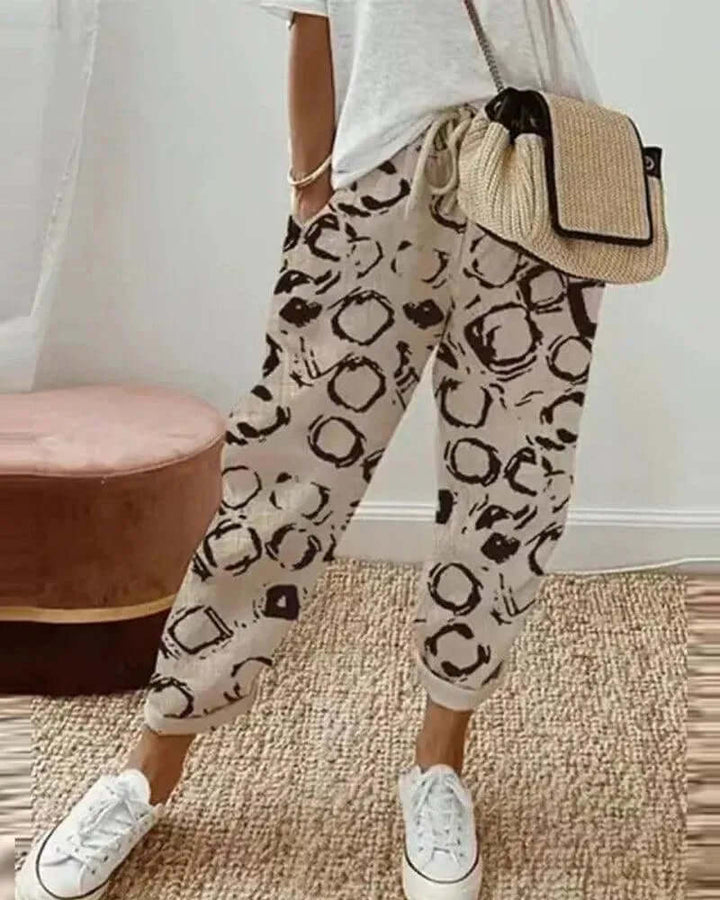 Stylish women's striped linen-blend casual trousers, comfortable & relaxed fit pants with drawstring for summer.