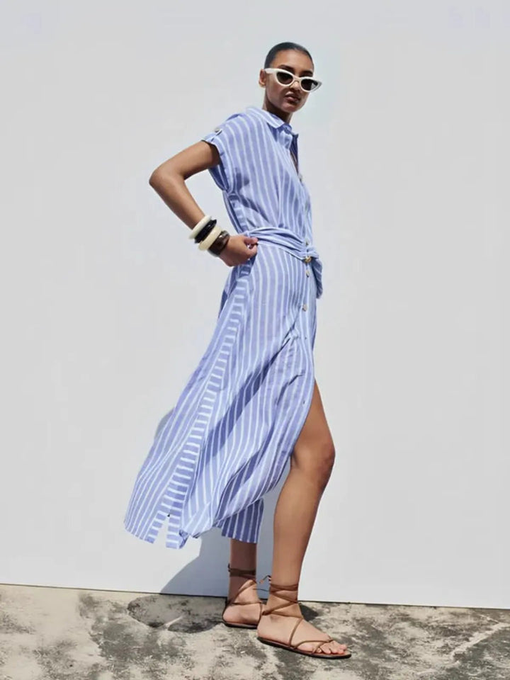 Elegant women's striped maxi dress, featuring a flattering belt. Versatile for work, casual, or summer wear.