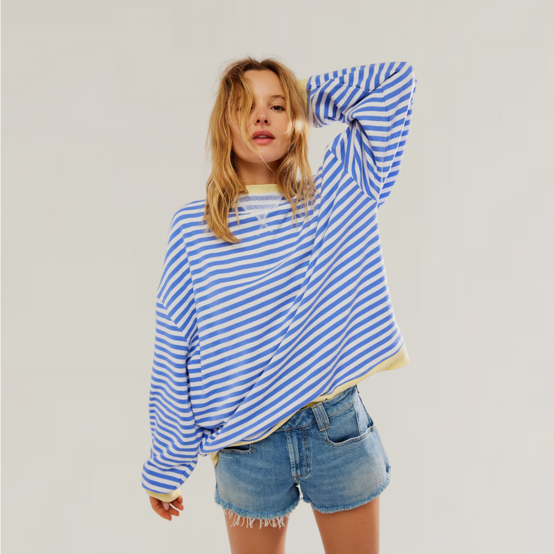 Women's striped oversized sweater, relaxed fit. Perfect for casual wear & ladies fashion, comfortable long sleeve top.