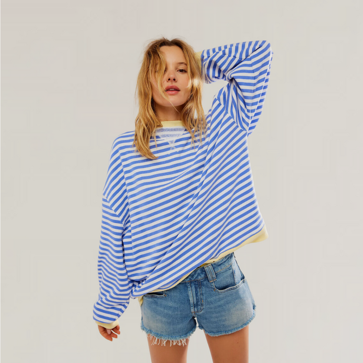 Women's striped oversized sweater, relaxed fit. Perfect for casual wear & ladies fashion, comfortable long sleeve top.