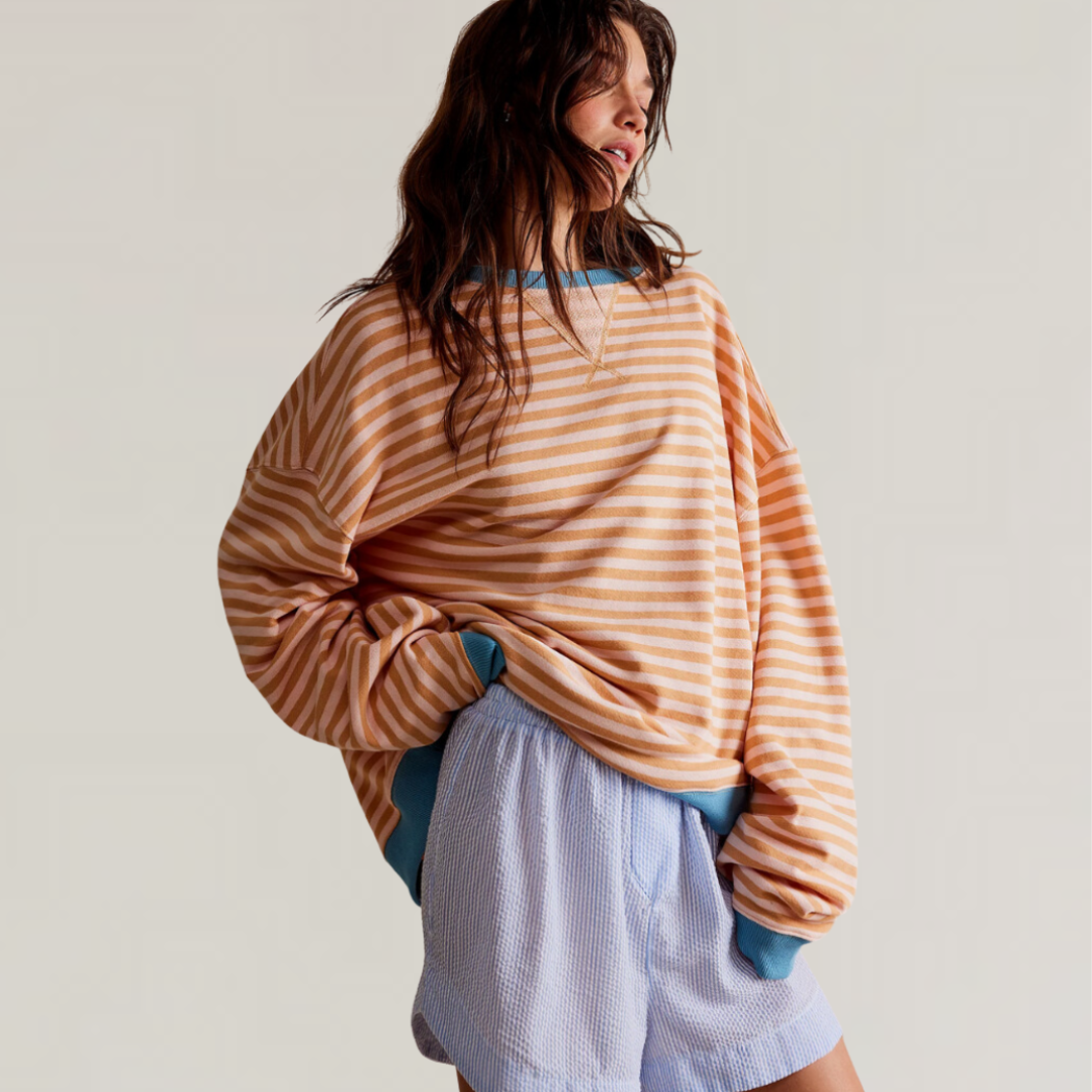 Nautical style women's striped oversized sweater, comfortable long sleeve top for a relaxed fit & everyday outfit.