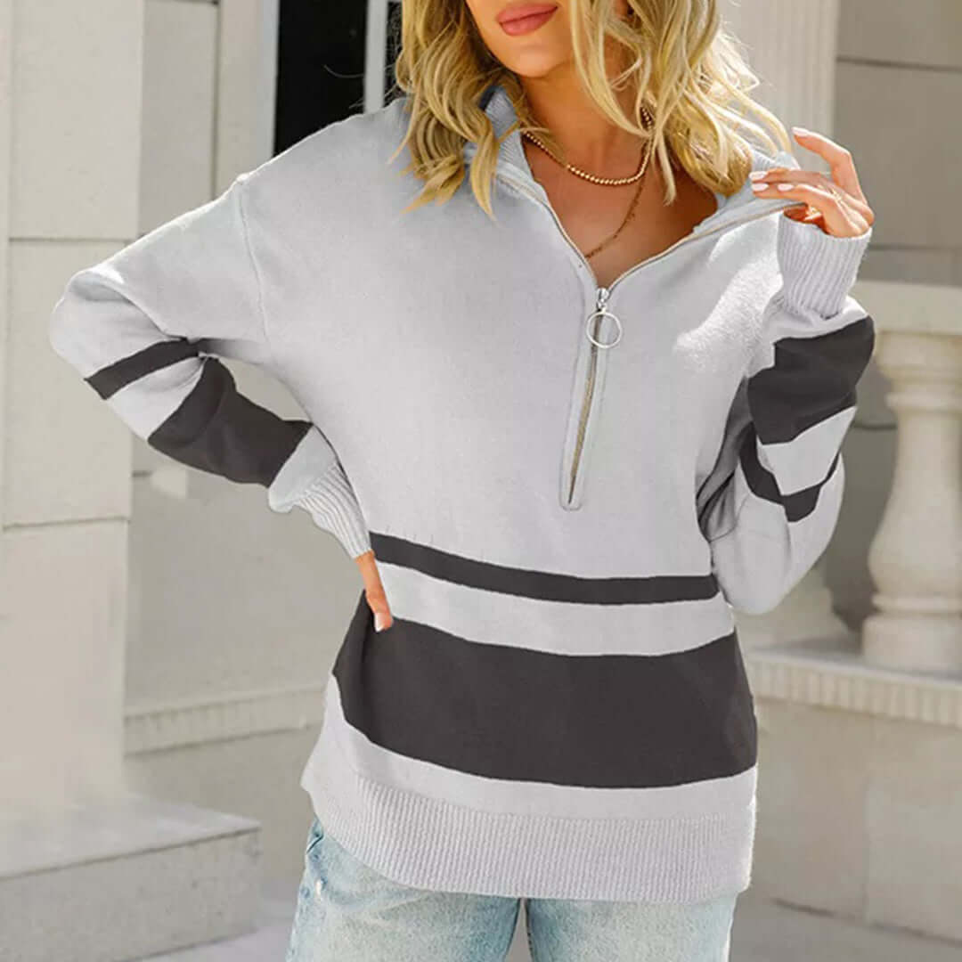Women's striped quarter-zip pullover sweater. Knit comfort, long-sleeve, versatile fall & winter fashion.