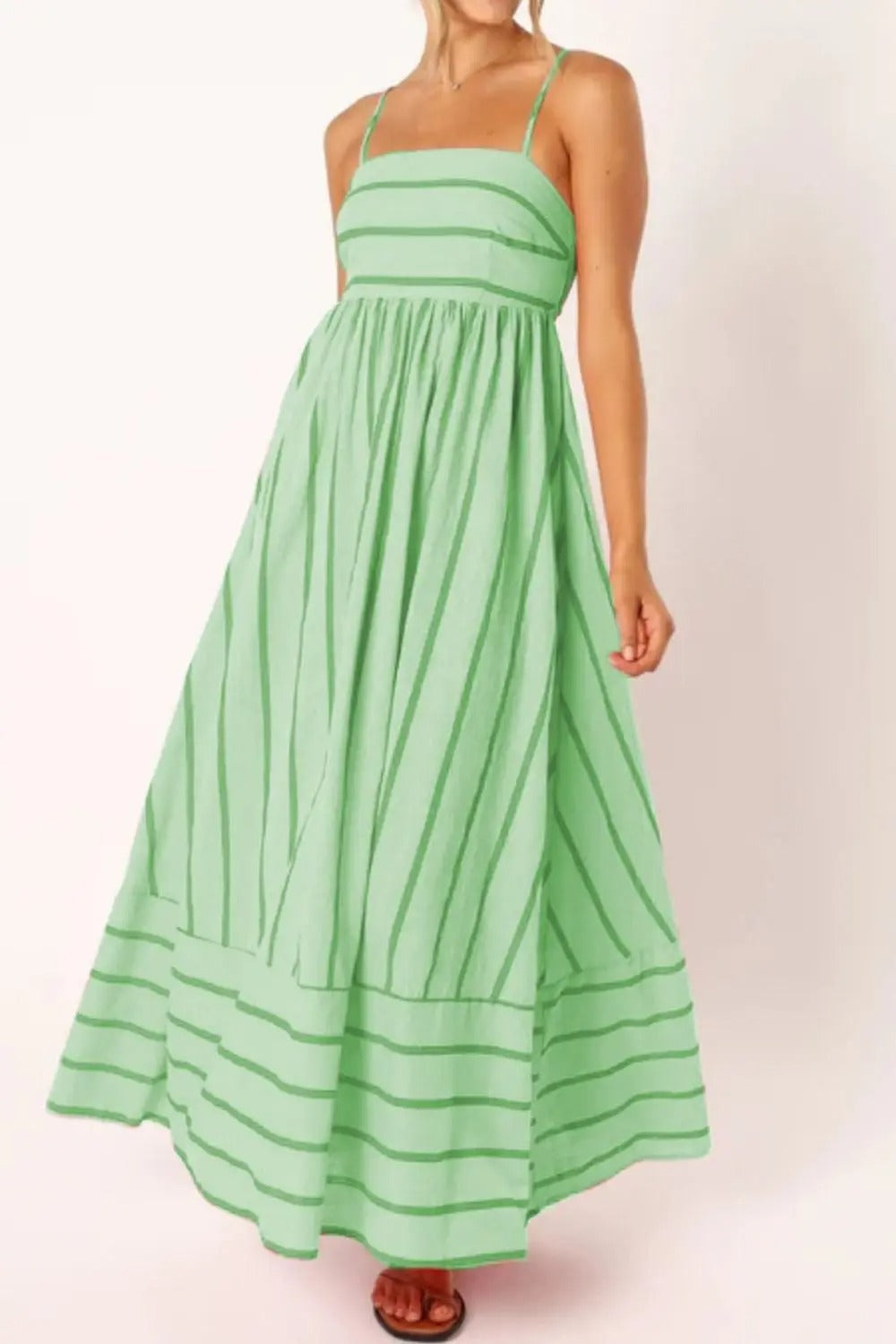 Women's striped strappy summer maxi dress with a flowy silhouette, great for beach & casual.
