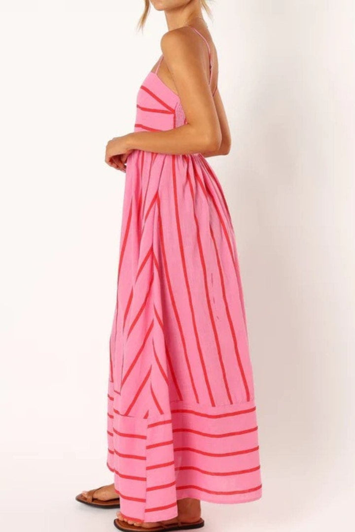 Vibrant striped strappy summer maxi dress for women, ideal for beach, vacation & casual wear.