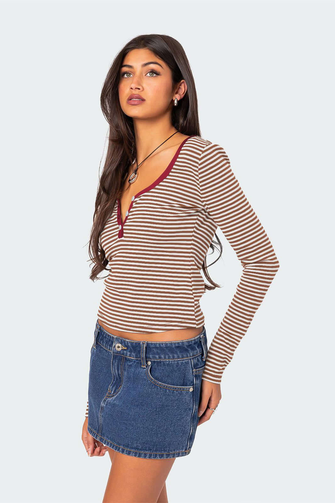 Comfortable women's long sleeve striped V-neck Henley top, perfect for casual wear.