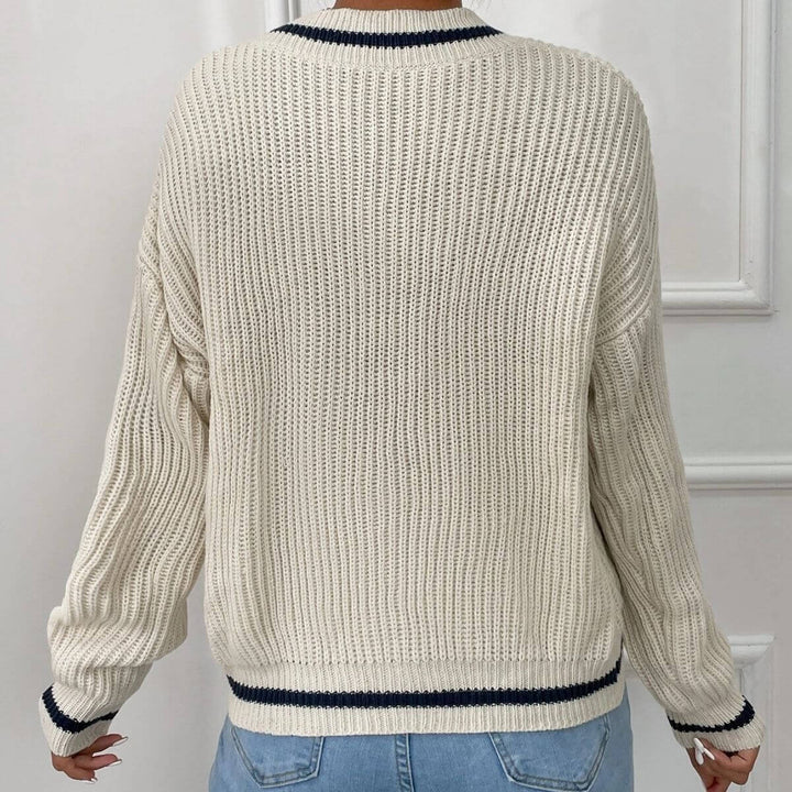 Women's V-neck relaxed fit striped jumper, comfortable and chic for any casual occasion.