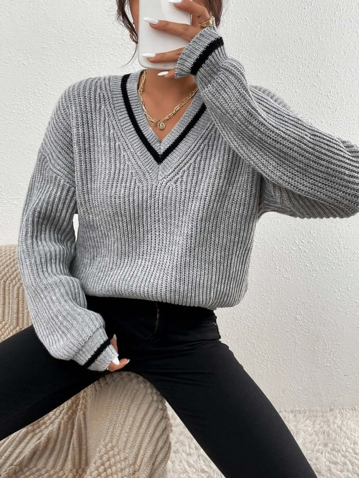 Women's long sleeve striped V-neck sweater, a relaxed fit pullover for effortless style.