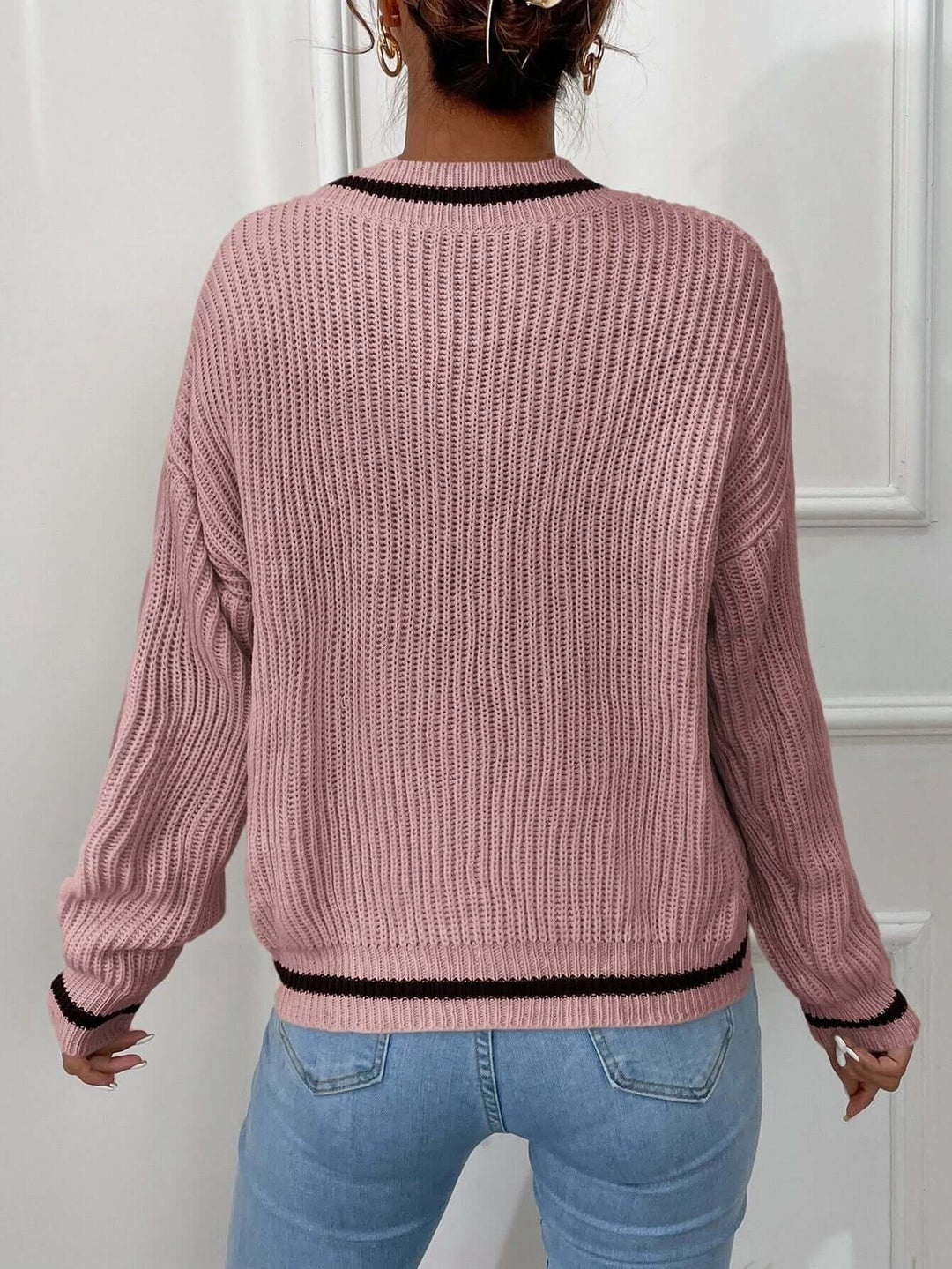 Cozy women's striped V-neck jumper, relaxed fit and comfortable for cold weather fashion.