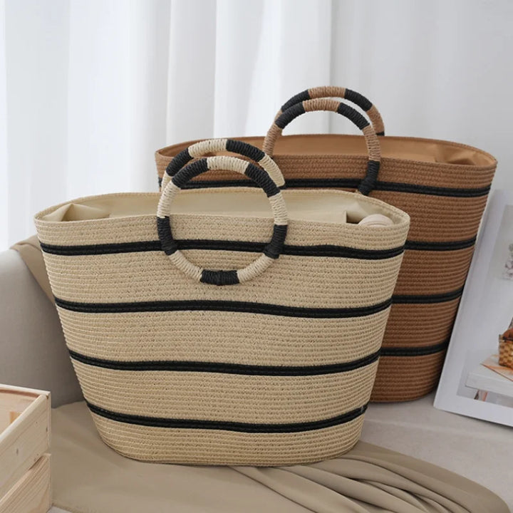 Chic women's striped woven tote bag. Ideal as a summer beach bag or a casual everyday fashion accessory.