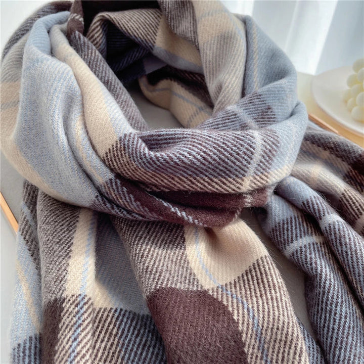 Soft & warm women's knitted checkered scarf with tassels. A must-have fall fashion accessory.