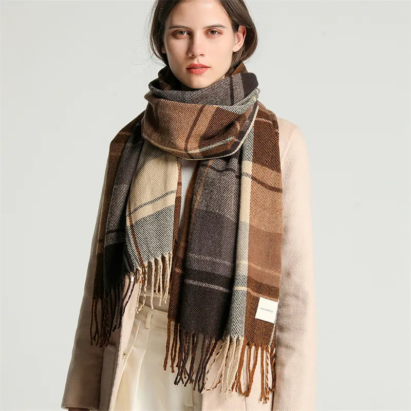View of a stylish women's knitted scarf with soft tassels & a checkered pattern. Essential accessory.