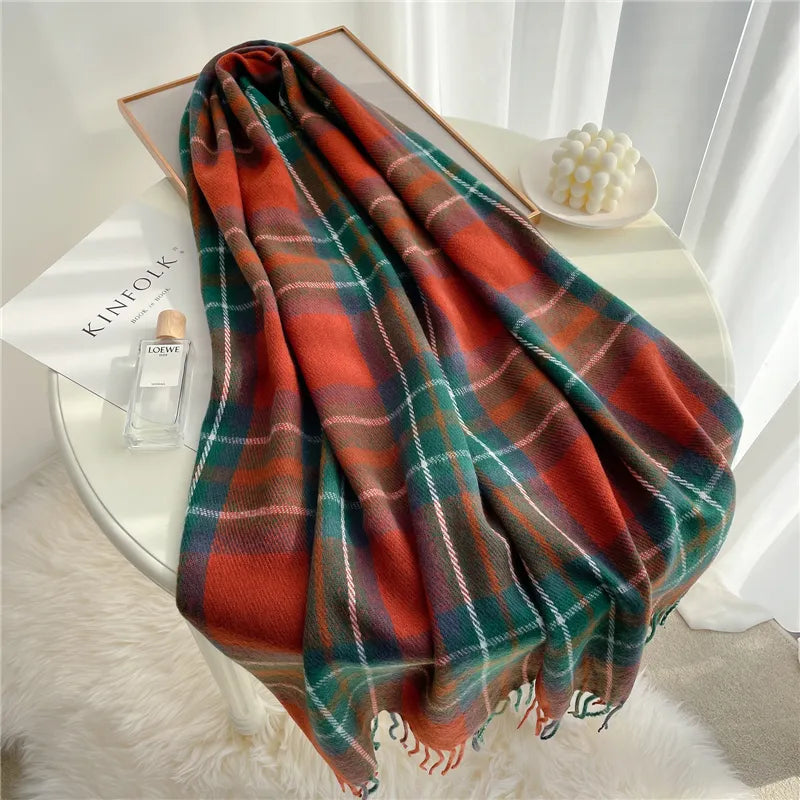 Trendy women's knitted tassel scarf in a stylish checkered design. Ideal for cold weather.