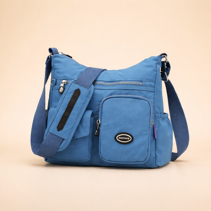 Stylish women's anti-theft shoulder bag; a lightweight & secure travel accessory.