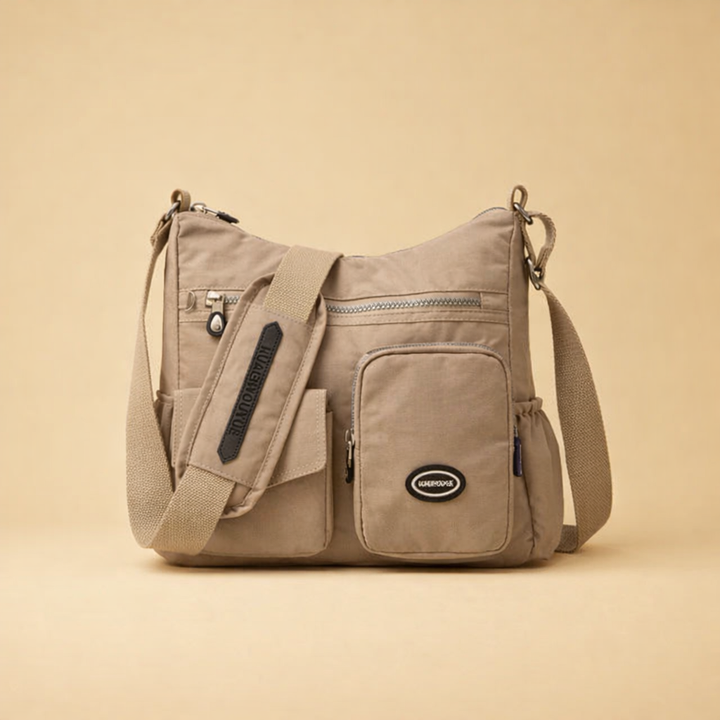Multi-pocket women's crossbody bag, anti-theft & lightweight for daily fashion.