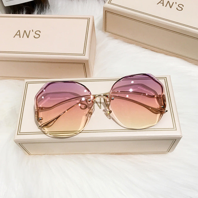 Fashionable women's boho ombre sunglasses, a stylish summer accessory with gradient lenses & UV protection.