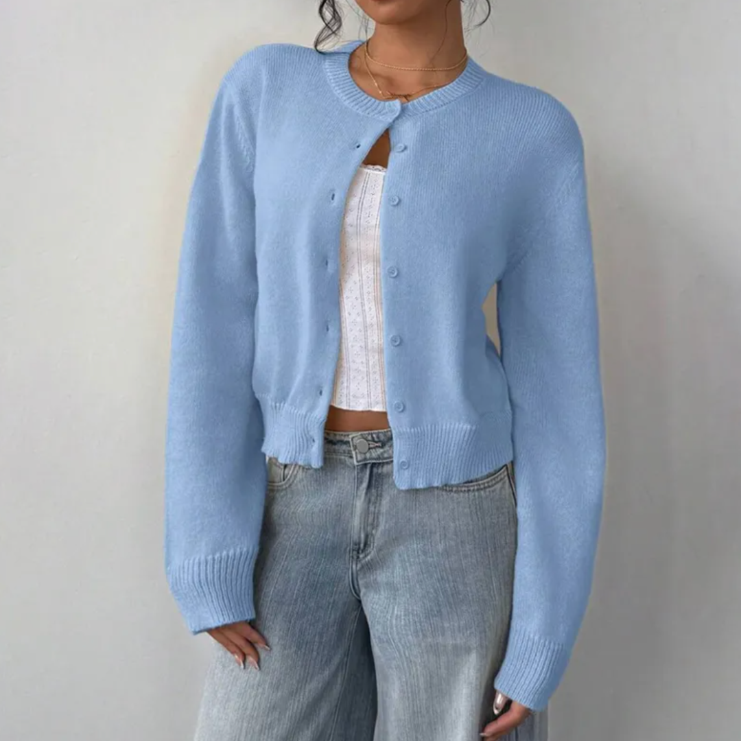 Ladies' elegant cropped cardigan sweater with delicate ribbed cuffs & hem.