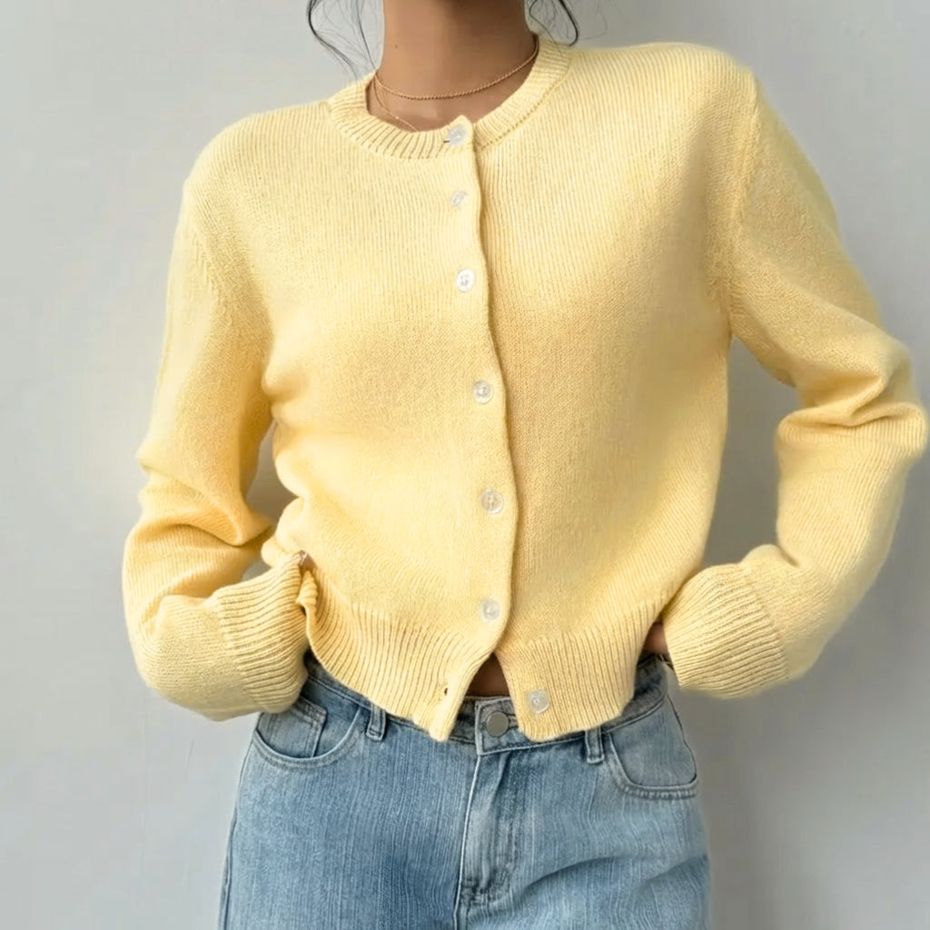 Women's fashionable cropped knit top. Ribbed trim and versatile for all seasons.