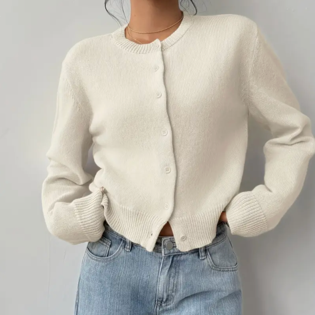 Trendy cropped cardigan for women. Ribbed trim adds a stylish touch.