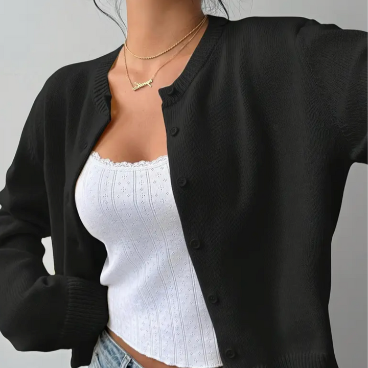 Stylish button-up cropped cardigan for women, with comfortable ribbed trim.