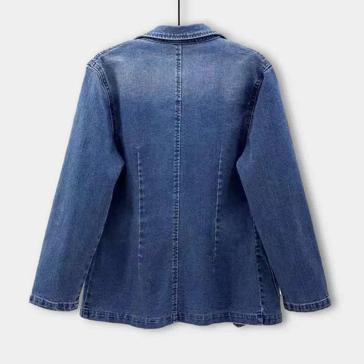 Chic women's denim jacket, tailored blazer style, blending casual comfort with stylish sophistication.
