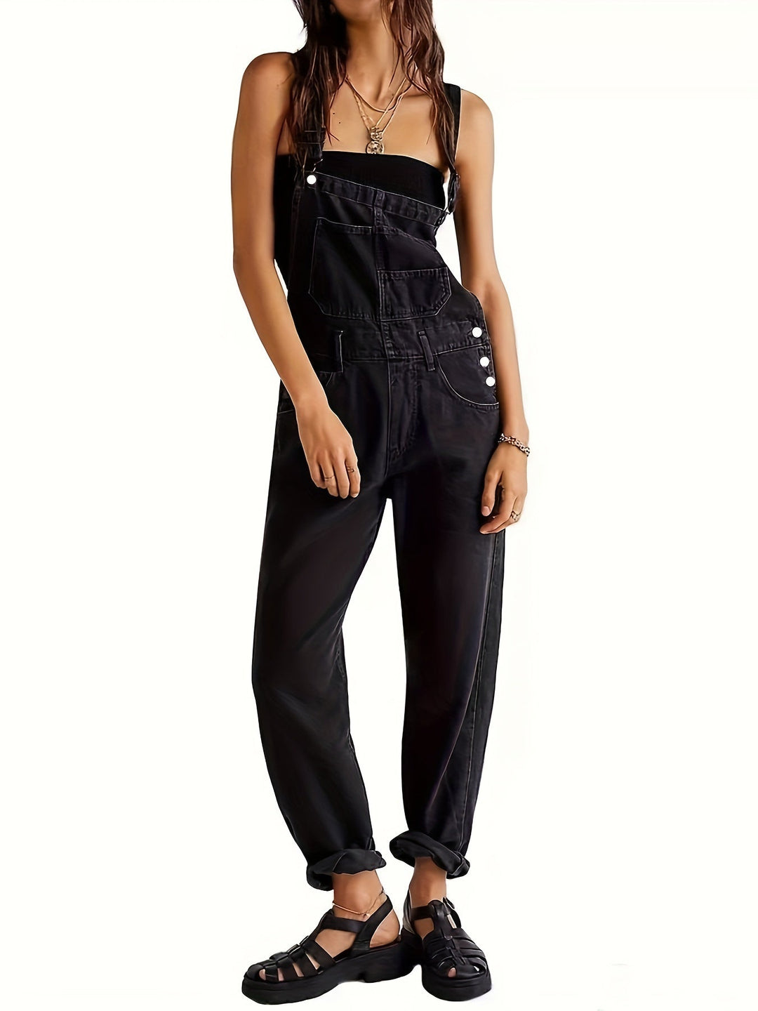 Versatile women's denim jumpsuit, perfect for spring, summer, or autumn casual outfits. Relaxed fit.