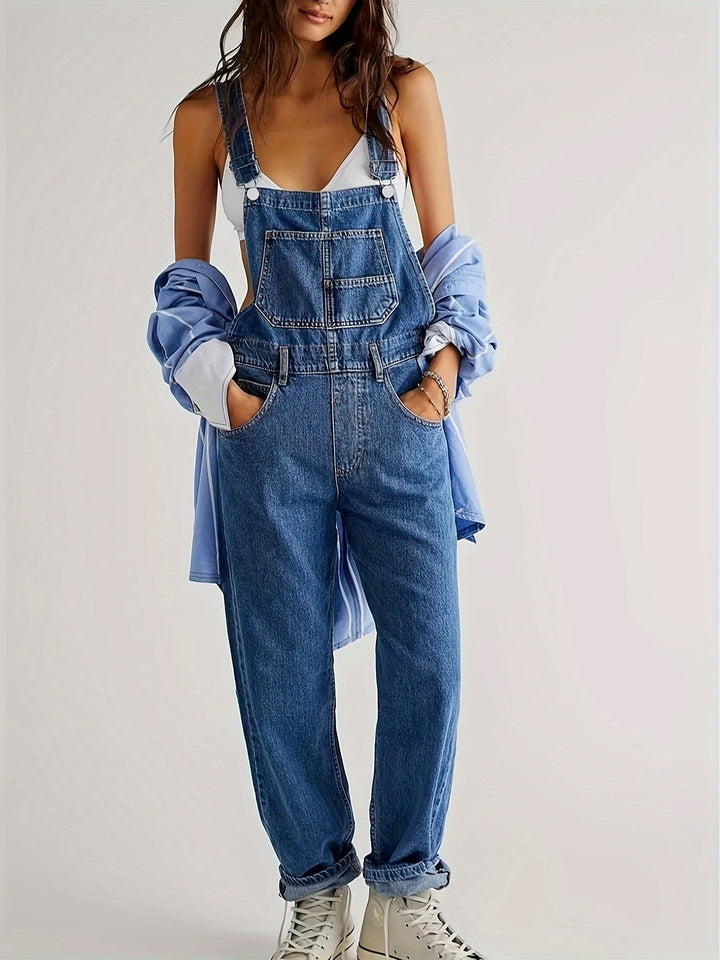 Comfy women's loose-fit denim jumpsuit, designed for relaxed everyday wear & effortless style.