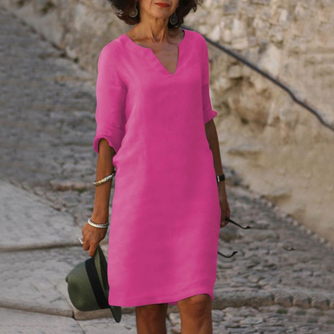 Soft & flowy women's summer dress, offering comfortable wear and an elegant casual style.