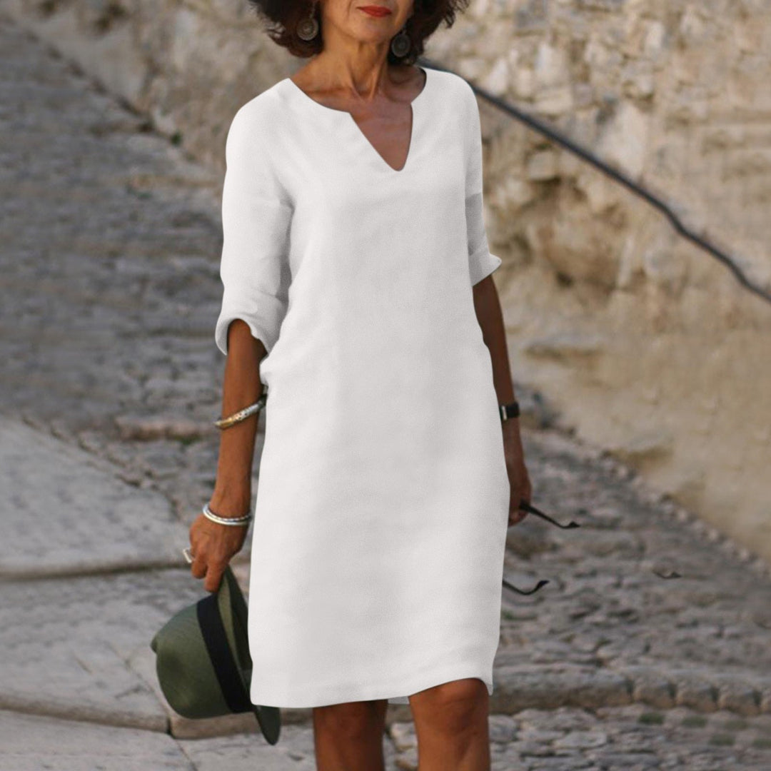 Comfortable women's flowy summer dress, an ideal vacation outfit or casual party dress.