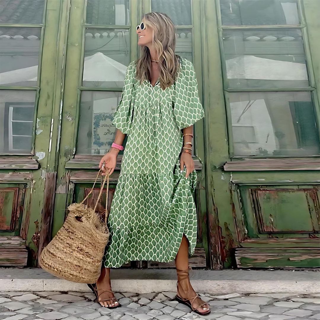 Modern geometric print high-low dress for women, offering a chic, flowy silhouette. Versatile fashion.
