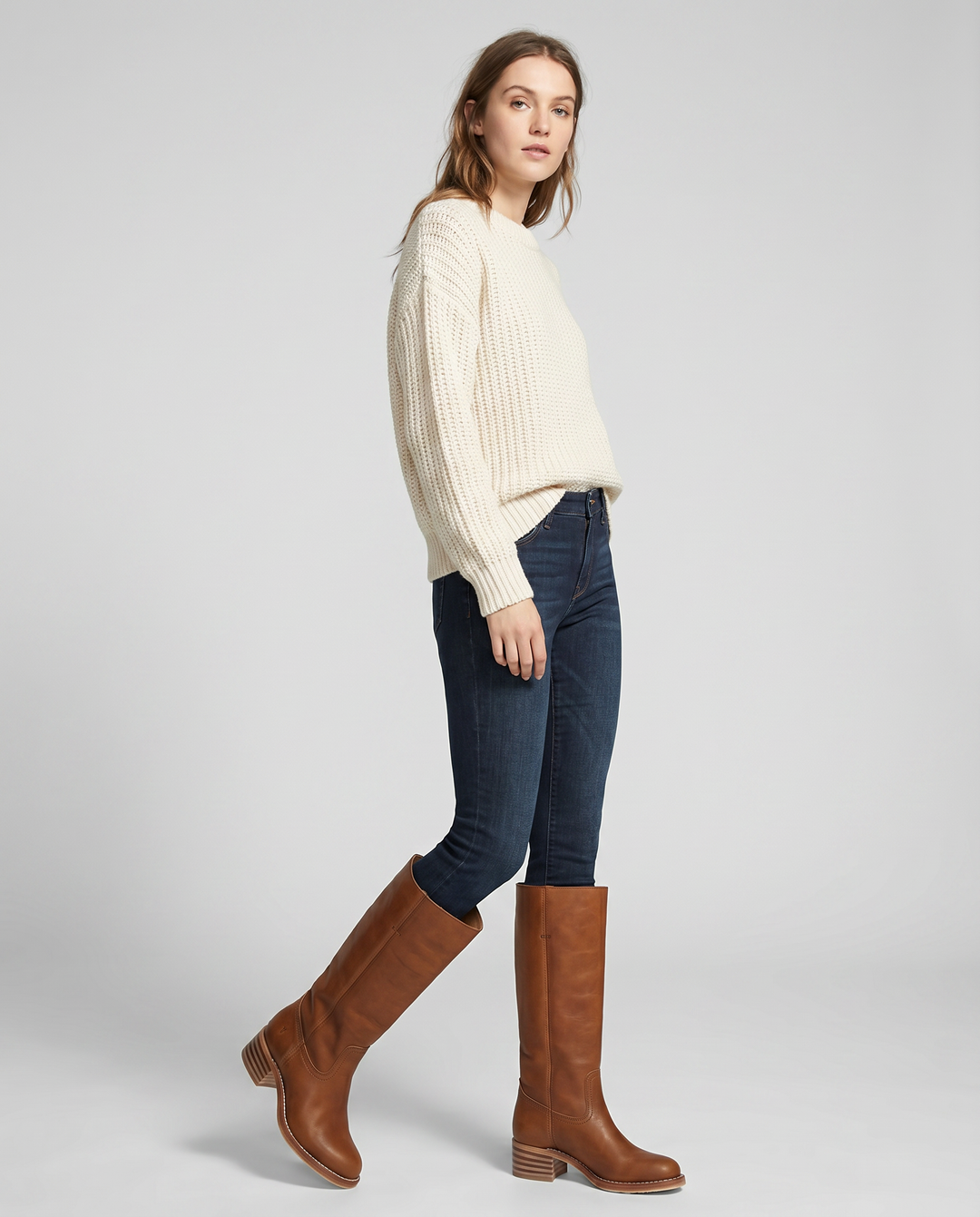 Elegant knee-high cowboy boots for women, featuring chic western-inspired design.