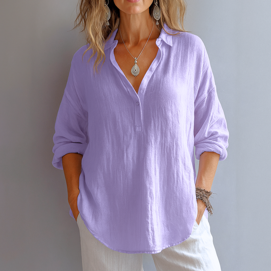 Purple women's fashion blouse, offering effortless elegance & comfort for any stylish occasion, casual or formal.