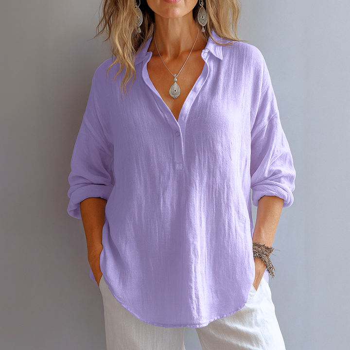 Purple women's fashion blouse, offering effortless elegance & comfort for any stylish occasion, casual or formal.