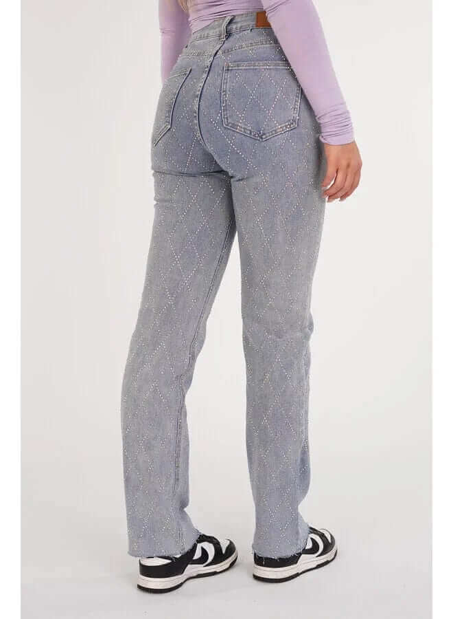 Elegant women's straight leg jeans with a textured diamond pattern, offering both style and comfort in denim.