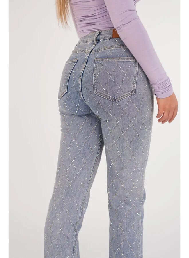 Women's straight leg bottom in premium denim, showcasing a distinctive diamond pattern for a refined casual outfit.