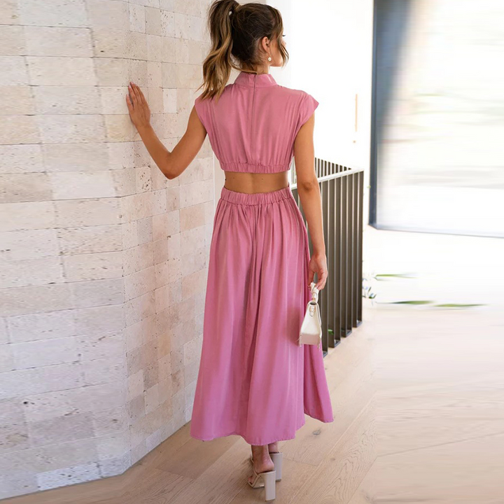 Elegant women's midi stretch dress. Versatile for party, vacation, or casual summer fashion. Short sleeve, high collar.