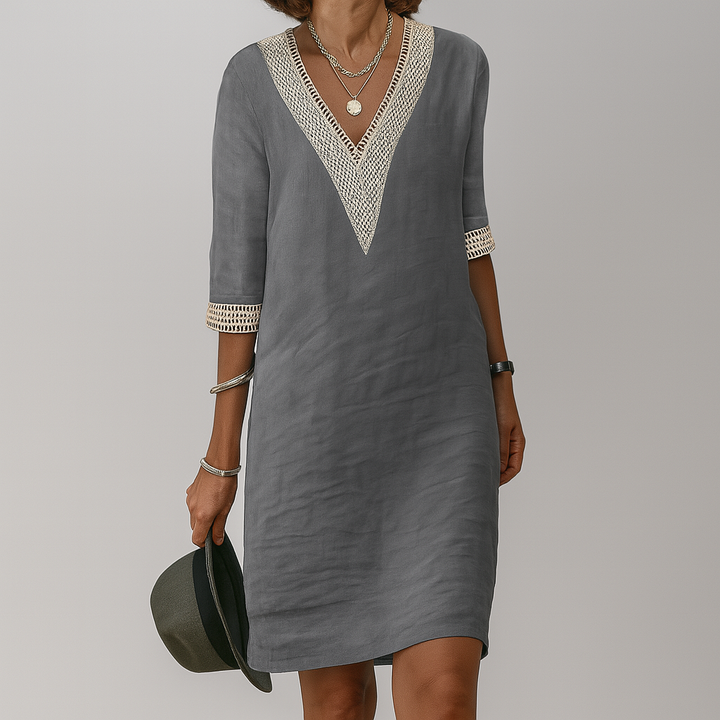 Effortless elegance: women's relaxed fit midi dress for comfortable and stylish summer wear.