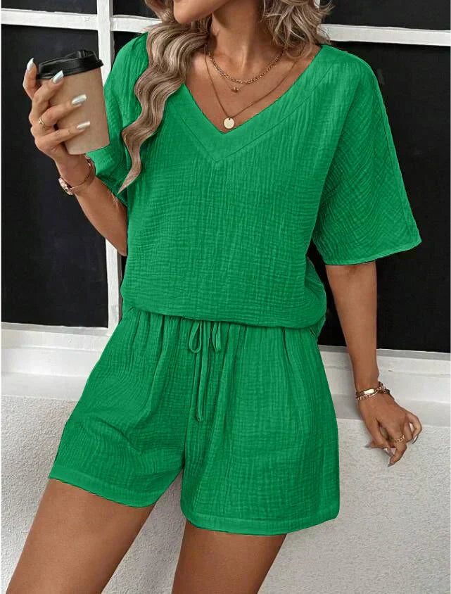 Women's stylish V-neck top & shorts set, a casual chic two-piece outfit perfect for summer fashion & comfort.